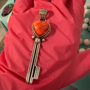 Red spiny sterling silver key pendant